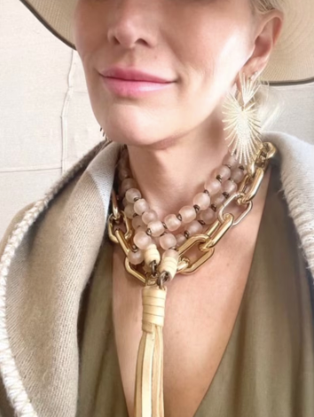 Blush African glass beads with antique brass findings and deerhide tassel