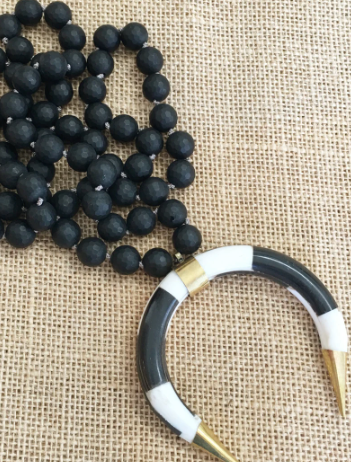 Knotted Matte Onyx Necklace With a Black and White Ox Bone Horn