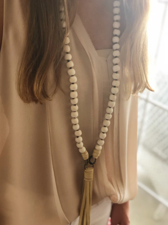 White Knotted African Glass Beads With Deerhide Tassel Necklace