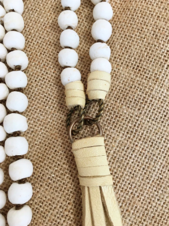 White Knotted African Glass Beads With Deerhide Tassel Necklace