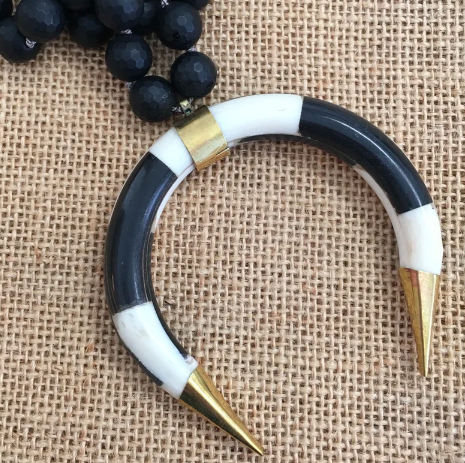 Knotted Matte Onyx Necklace With a Black and White Ox Bone Horn